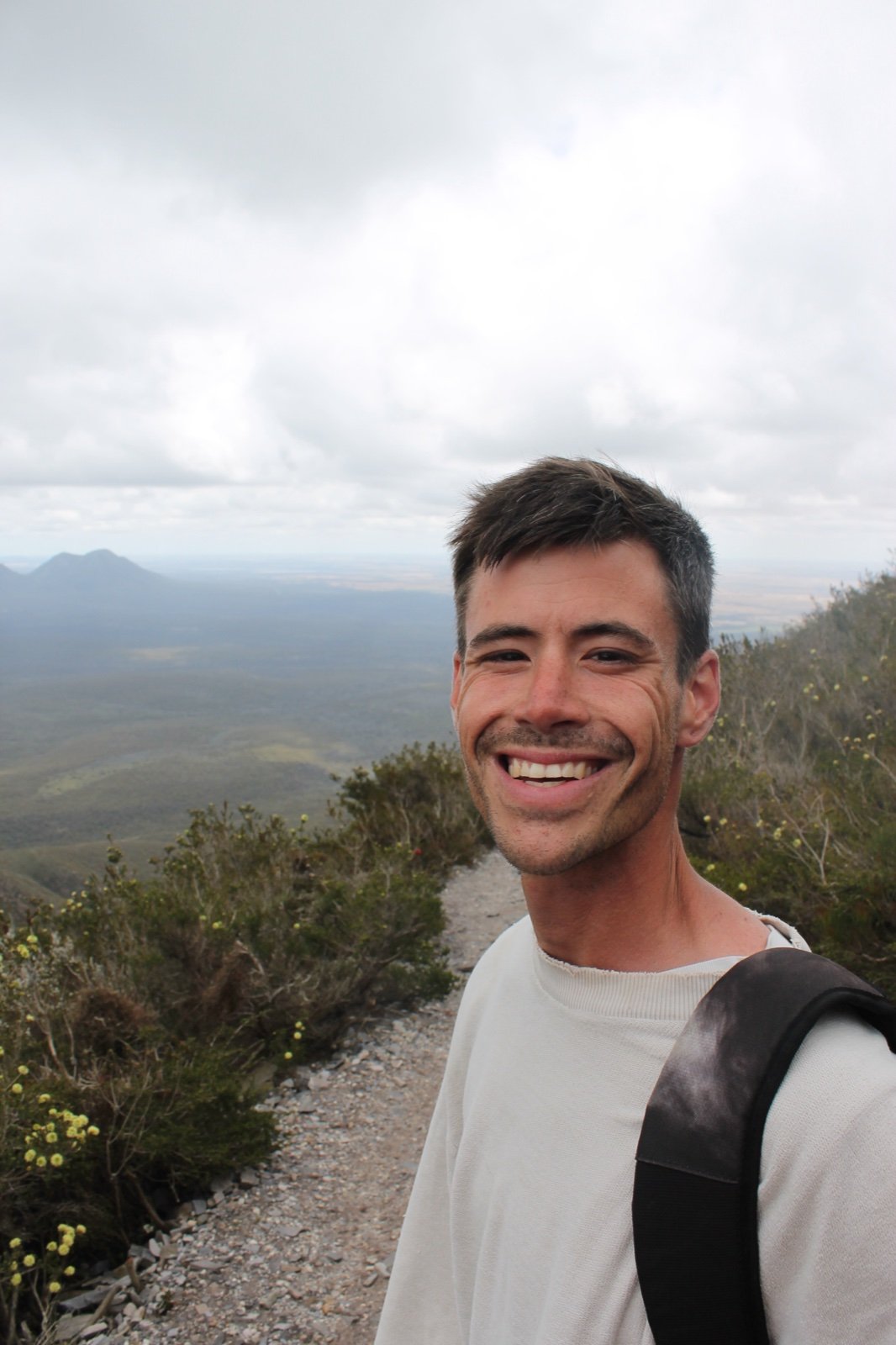 Jurgen Ilse smiling on a mountain trail